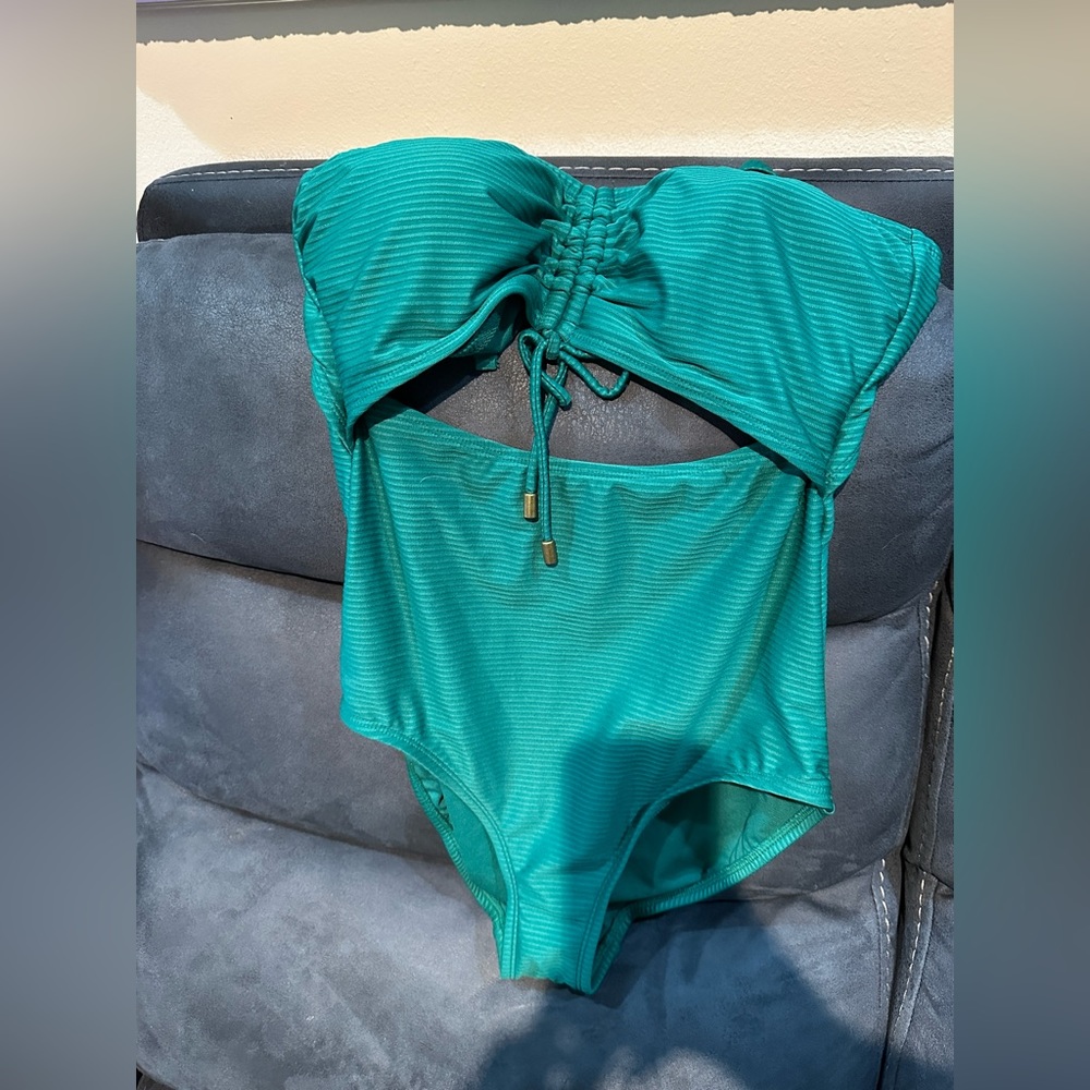 Brand new green bathing suit